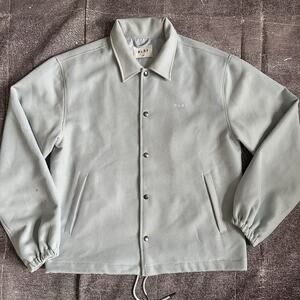 Men's Olaf Hussein Pastel Light Blue Button Up Face Logo Print Coach Jacket Sz L